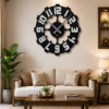 Statement SHIU industrial gear wall clock mounted as the central wall decor above a cream couch in a contemporary apartment living room.