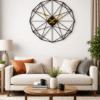 Large SHIU black polygon wall clock displayed as a contemporary centerpiece above a cream-colored sofa in a modern living room.