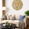 SHiU large ornate golden wooden wall clock styled as statement decor above a modern beige sofa in a brightly lit living room.